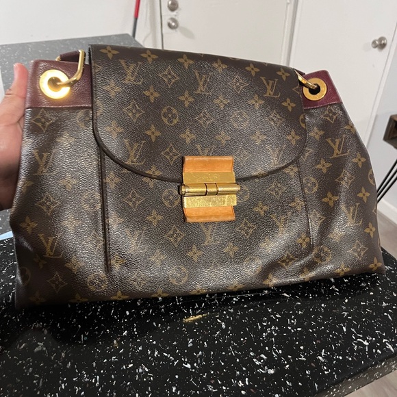 Louis Vuitton Monograma
Aube Olympe - Picture 1 of 6